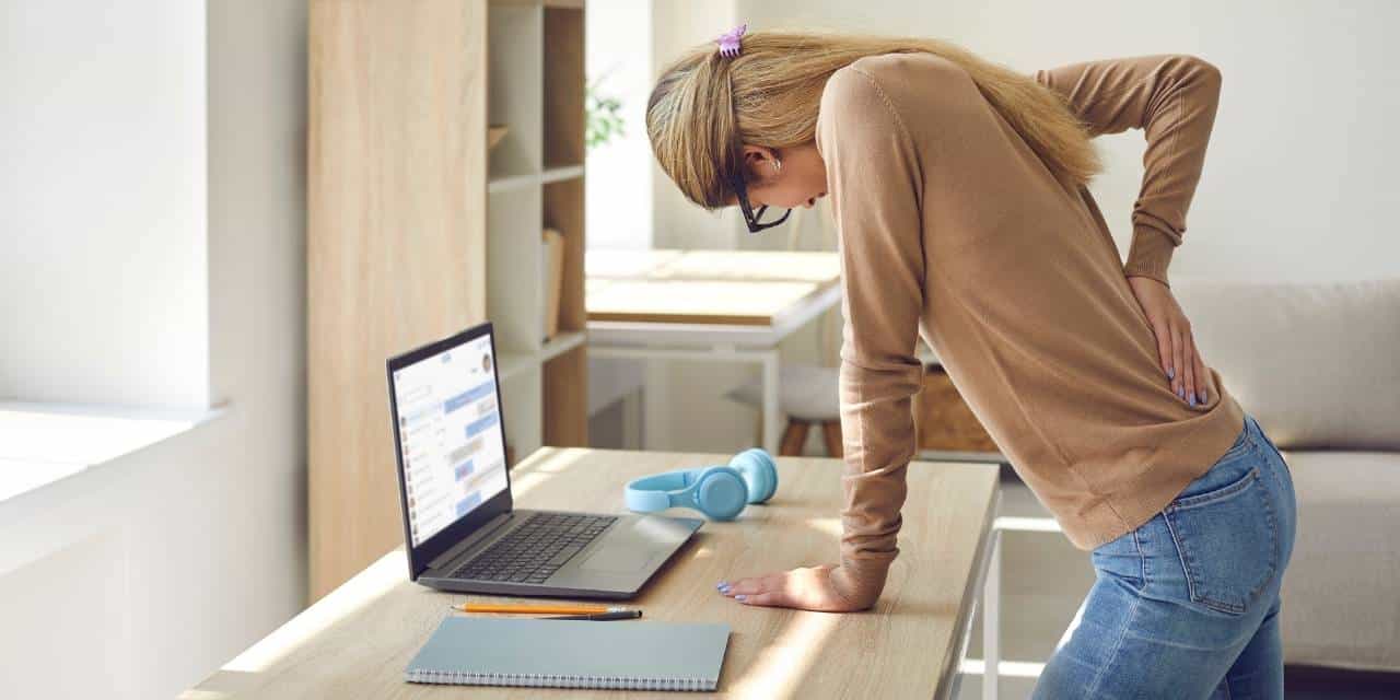 man holding knee with pain